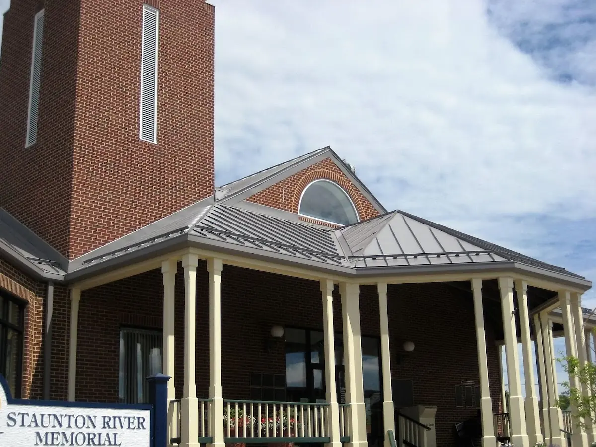 Skilled roofing craftsmen working on a residential roof in Montrose Village